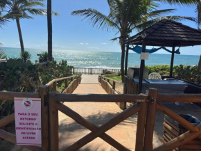 Flat Guarajuba 4 quartos térreo à Beira Mar - pé na areia - governança com arrumadeira e Wi Fi inclusos